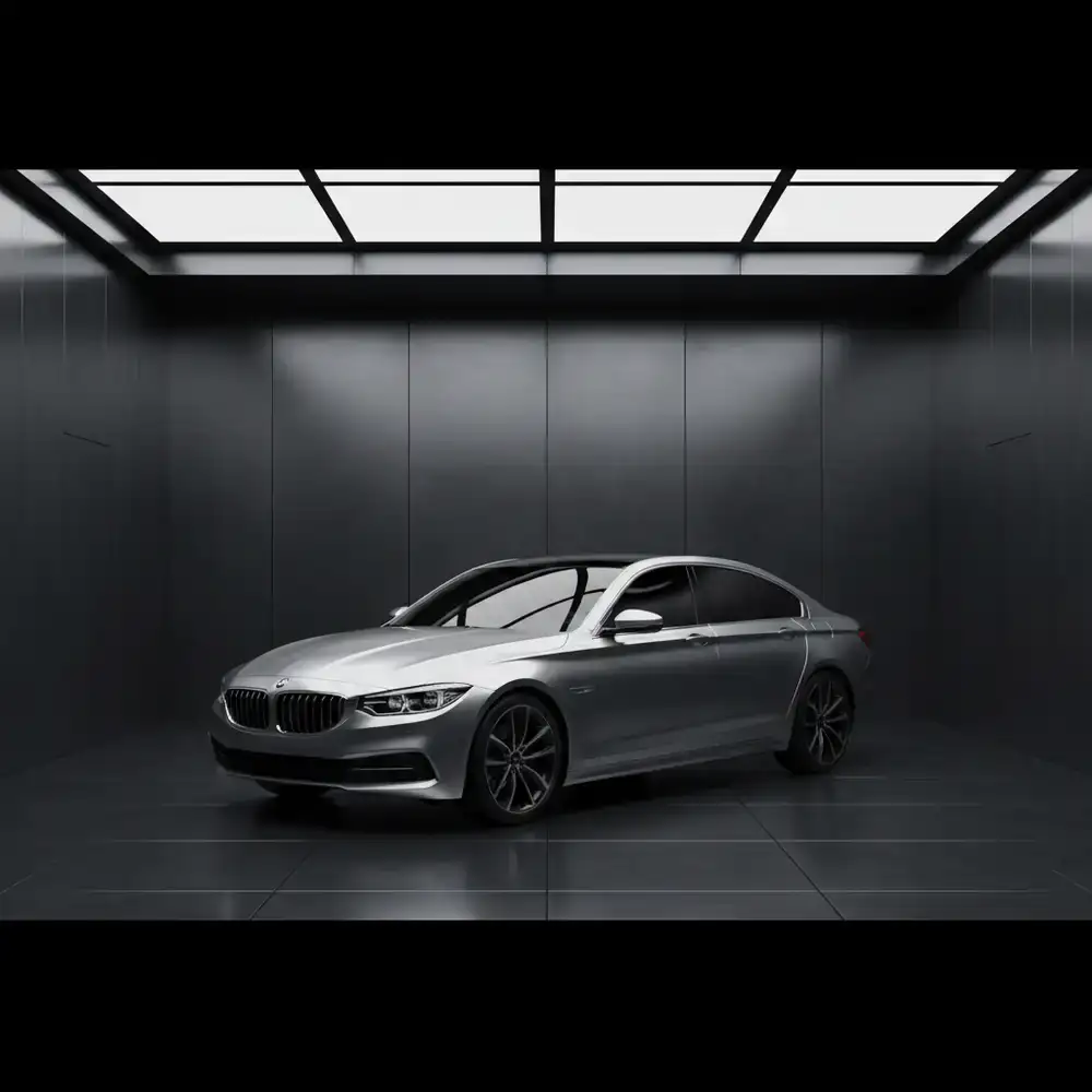 Sleek metallic silver sedan in a minimalist studio